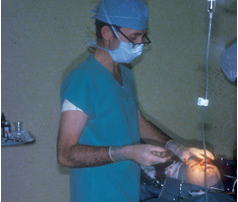 doctor performing an operation on patient